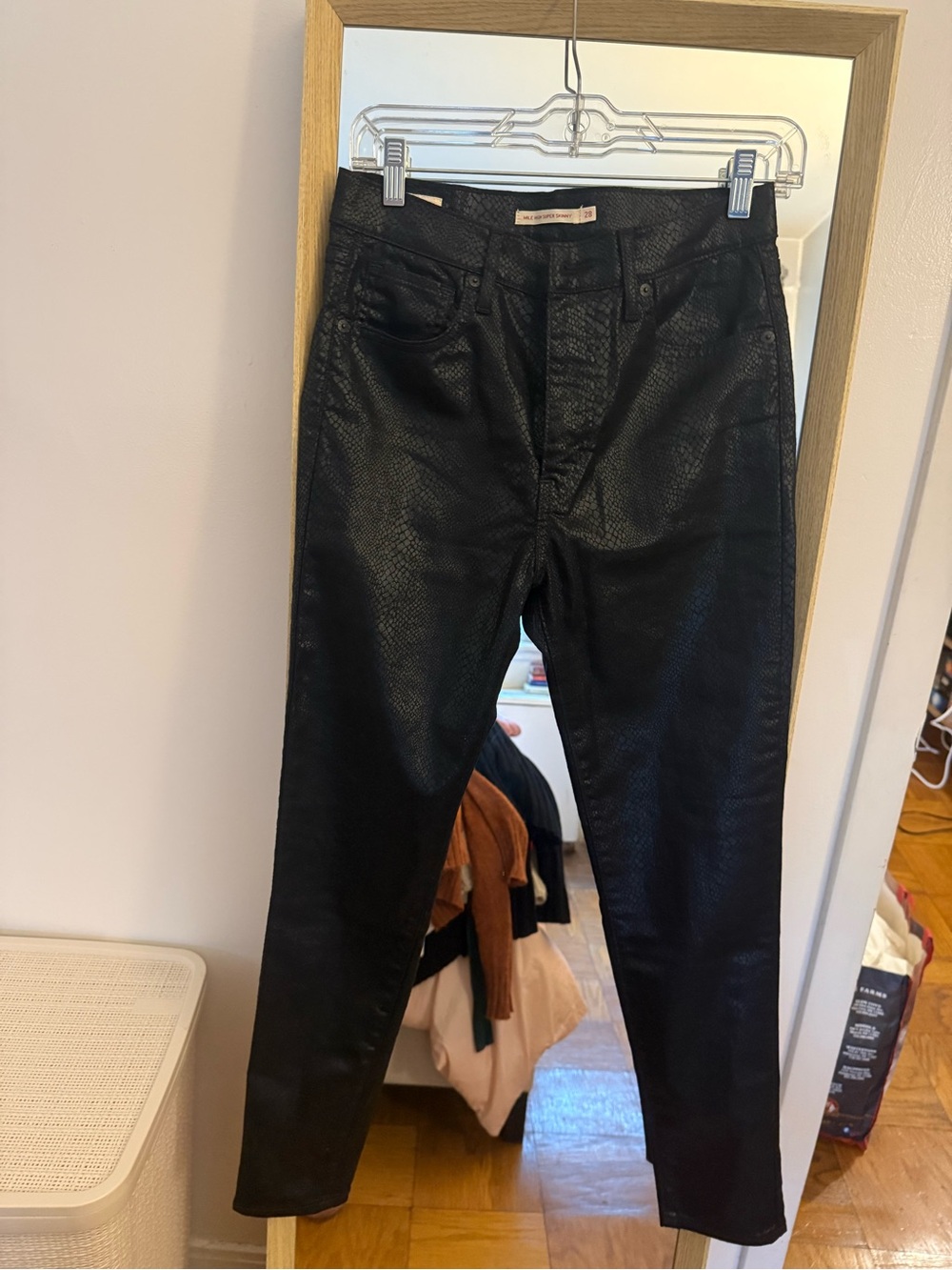 Black snakeskin print Levi’s skinny jeans